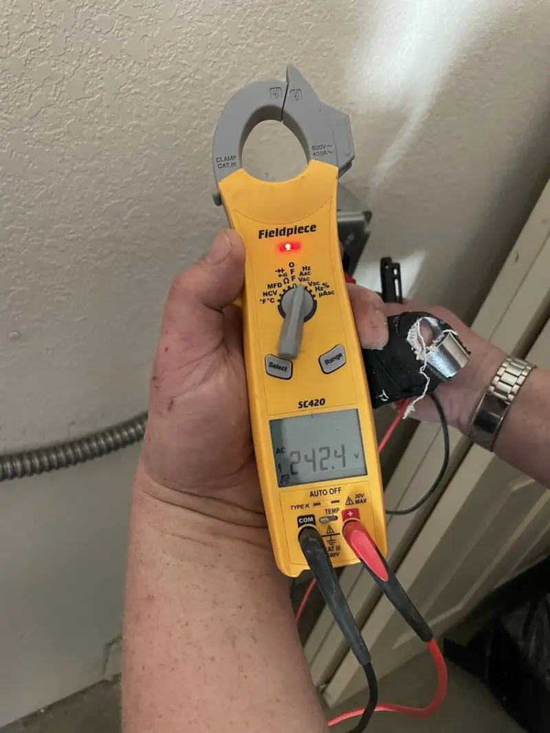Voltage testing with clamp meter during Aluminum Wiring Replacement in Crestview
